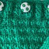 3 Unique white and green soccer ball buttons on one shoulder
